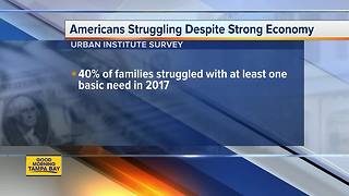 Despite strong economy, many Americans struggling to get by
