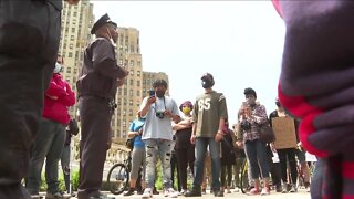 Police Commissioner Byron Lockwood meets protesters in Niagara Square