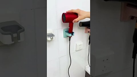 ⭐Product Link in Comments/Bio⭐ Upgrade your bathroom with our sleek Hair Dryer Holder Stand!
