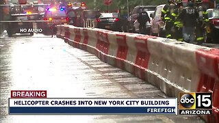 Helicopter crash lands on top of New York city building