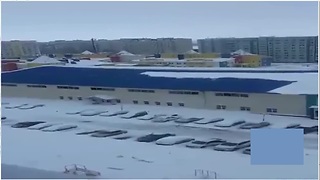 Roof Glacier Causes Massive Layers Of Snow To Fall Onto Parked Vehicles