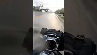 riding my motorcycle in the rain.