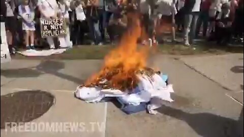 NURSES IN STATEN ISLAND NEW YORK BURN THEIR SCRUBS