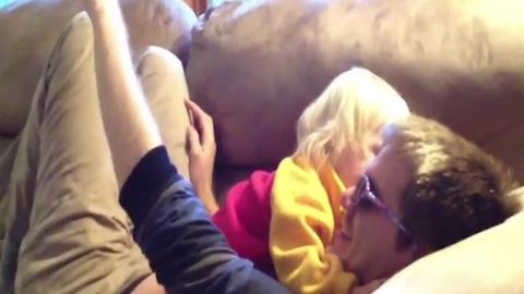 A Tot Girl Tries To Protect Her Dad In A Pillow Fight