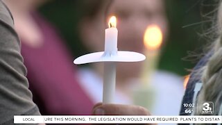 Bellevue community members hold candlelight vigil in honor of children found dead over the weekend