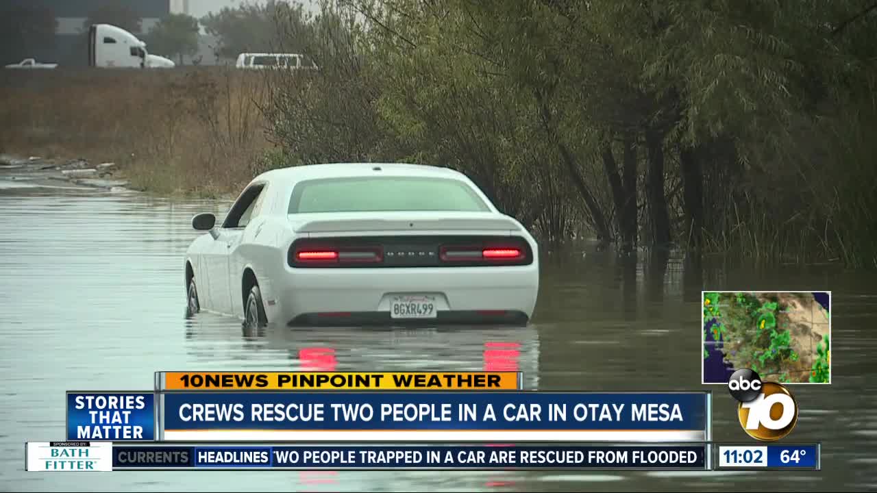 Crews rescue two people in Otay Mesa car