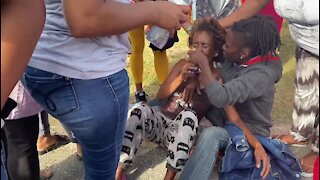 WATCH: Emotional residents gather outside Tazne's home following discovery of corpse (iQN)