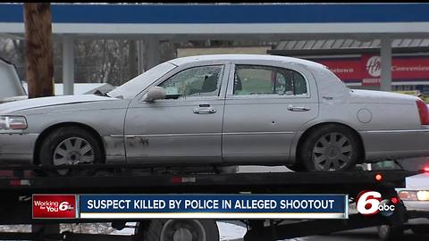 Suspect killed in police shootout after carjacking, chase