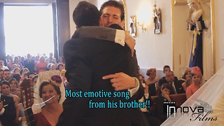 Brothers sing emotional song to couple at wedding