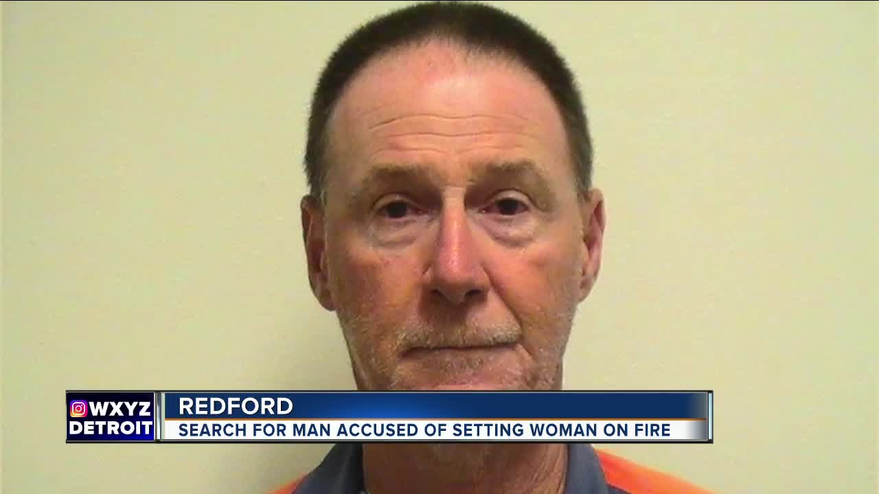 Search for man accused of setting woman on fire