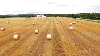 Drone captures unique perspective of rural farm during hay season