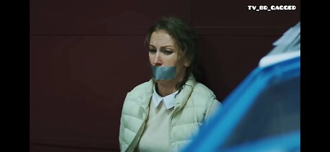 The robber at the gas station taped the mouth of the Russian beauty