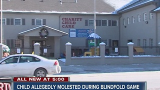 Child allegedly molested during blindfold game