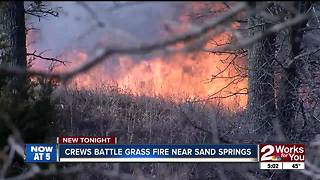 Crews battle grass fire near Sand Springs