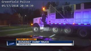 Greenfield officer, Good Samaritan help driver passed out in moving dump truck