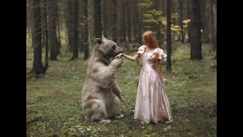 Shocking video from Russia. Wild bear dancing with a girl