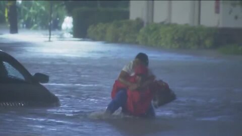 Orlando news reporter rescues nurse from floodwaters