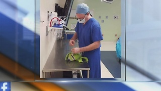 Doctor at Children's Hospital performs surgery on child and his toy