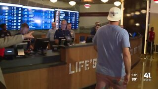 Officials, fans celebrate launch of Kansas sports wagering