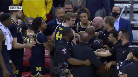 Michigan coach Howard hits Wisconsin assistant after a loss