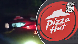 Woman pulled from sinking Pizza Hut delivery car