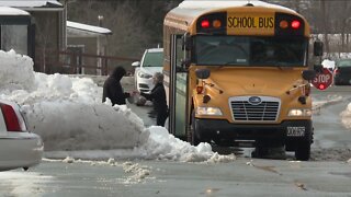 Ravenna School District bus drivers distribute lunches while students learn remotely
