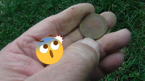 Soccer field hunt finds a rare flip coin!