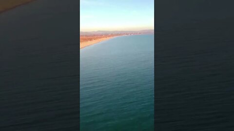 Drone recording down the beach