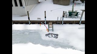 Snowmobiles on the Black river, winter to spring transition.