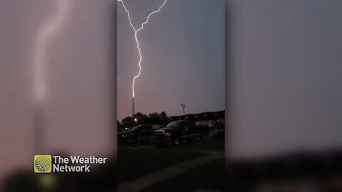 See it in slo-mo: Lightning bolt strikes pole