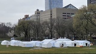 tents in central park NYC - military bringing children up from the underground