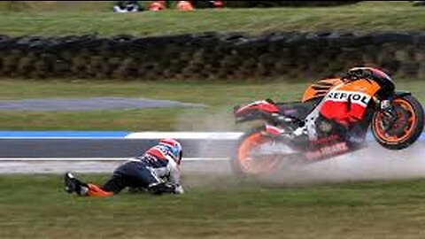 "High-Speed Havoc: Intense Motorcycle Race Crashes and Near Misses"