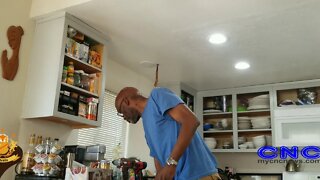 Yombo refinishing the kitchen's Cabinets