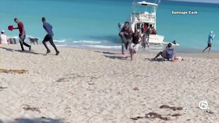 Migrants come ashore on beach in Jupiter