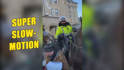 Super slow-motion. The moment an elderly woman is trampled by horses at Ottawa Freedom Convoy rally.
