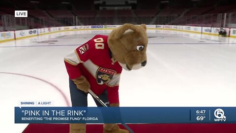 Warming up for 'Pink in the Rink' a game supporting breast cancer awareness