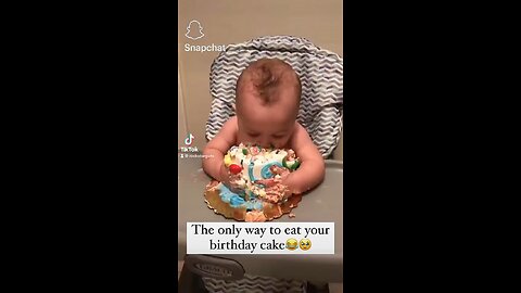 Cute baby eating cake
