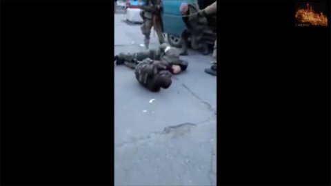 Ukraine Soldiers shoot 10 Restrained Russian POW's (Graphic)