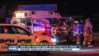 Two people hurt in motorcycle vs. car crash