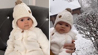 Baby has mixed feelings about first snowfall experience