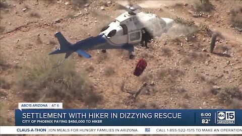 Hiker gets $450,000 settlement after dizzying rescue