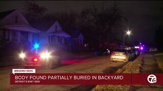 Body found partially buried behind Detroit home; FBI assisting police