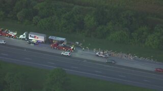 FedEx trailer tips over, strews package long Florida's Turnpike