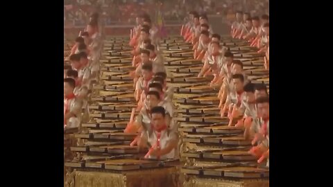 The sound of 2,008 people drumming together at the opening ceremony of the 2008 Beijing Olympics