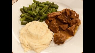 Beef stew with mashed potato and green beans for dinner