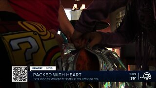 Denver7 Gives: Girl fills backpacks with toys for children who lost everything in Marshall Fire