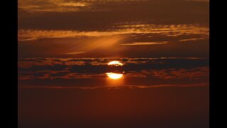 SUN BEING AHEAD AND BEHIND CLOUDS