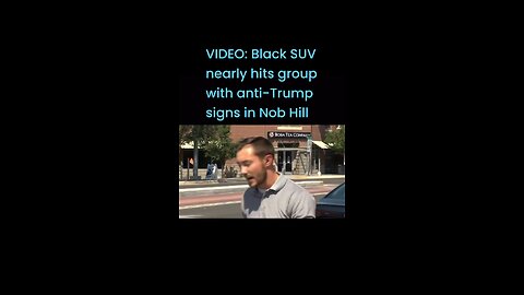 VIDEO: Black SUV nearly hits group with anti-Trump signs in Nob Hill #lioneyenews #NewsUpdate