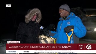 Clearing off the sidewalks after the snow