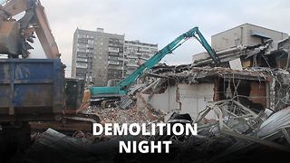 Residents gawk as 100 buildings demolished over night